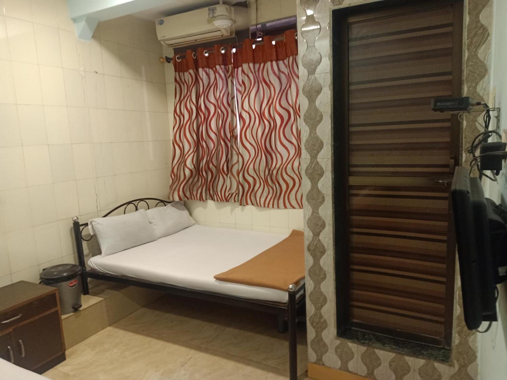 Hotel Central Inn Bombaim Quarto foto